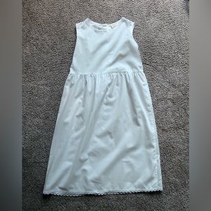 lavender blue slip, new with tags. size 8. white. perfect condition.